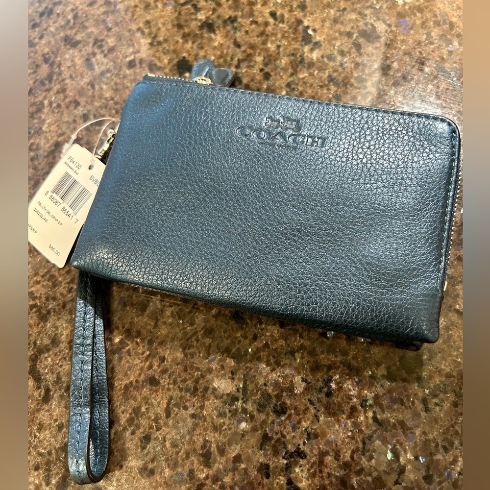 Perfect for gifting Coach pretty blue double zippered wristlet.